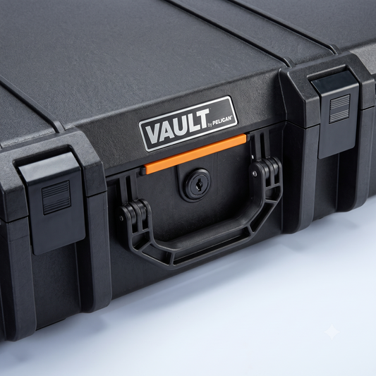 Pelican Vault V730 tactical rifle case close-up showing keyed lock, Press and Pull latch, and reinforced carry handle