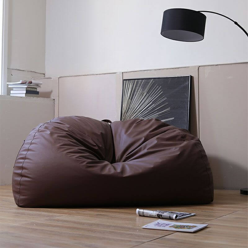 Deflated bean bag chair losing its shape and height, demonstrating why bean bag chairs go flat over time