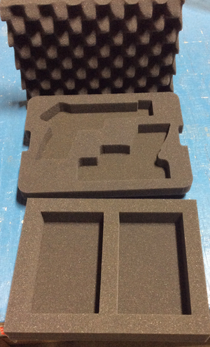 Kimber 1911 ELE custom cut foam insert with precut pistol cavity and two accessory compartments shown