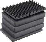 Pelican 1557 AirFS 3-piece replacement foam set with convoluted top foam and two stacked black flat foam inserts